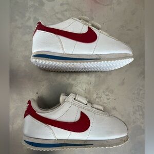 Nike Cortez Kids White Sneakers with Red Swoosh and Blue Trim